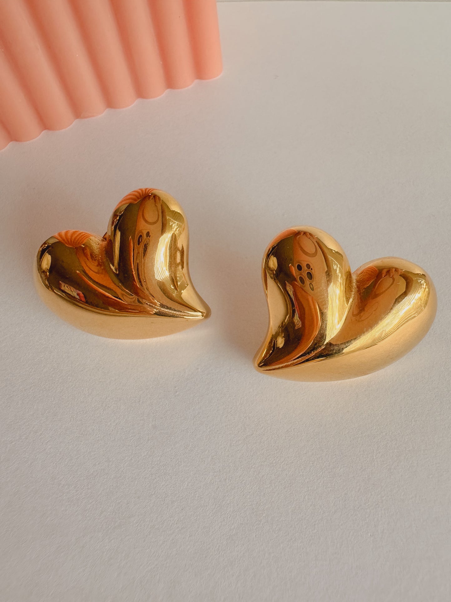 Gold heart earring